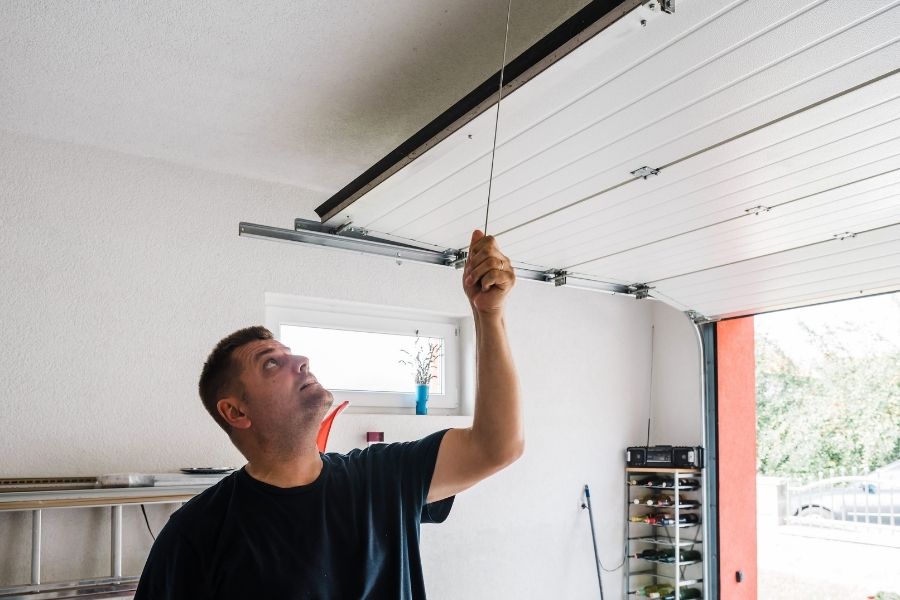 Here are some problems with a garage door that you should take care of right away